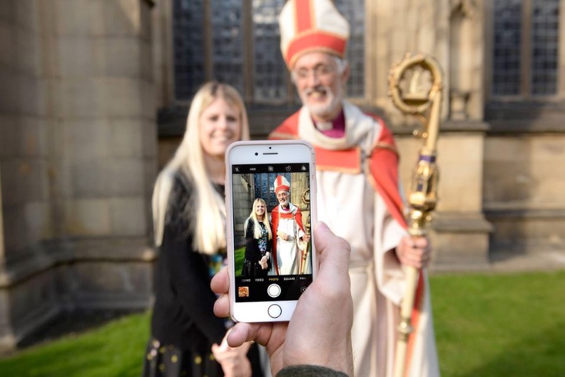 taking photo of bishop