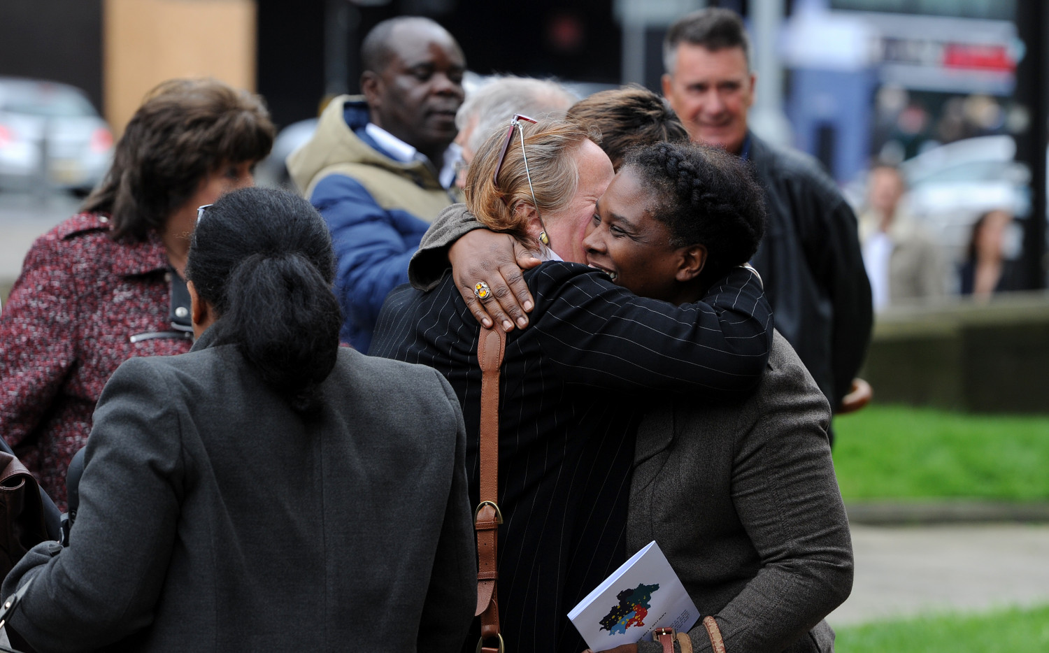 Clergy hugging